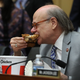 Rep. Steve Cohen (D-TN) takes a bite of chicken after Attorney General William Barr was a no show for a House Judiciary Committee hearing on Capitol Hill May 2, 2019 in Washington, DC.